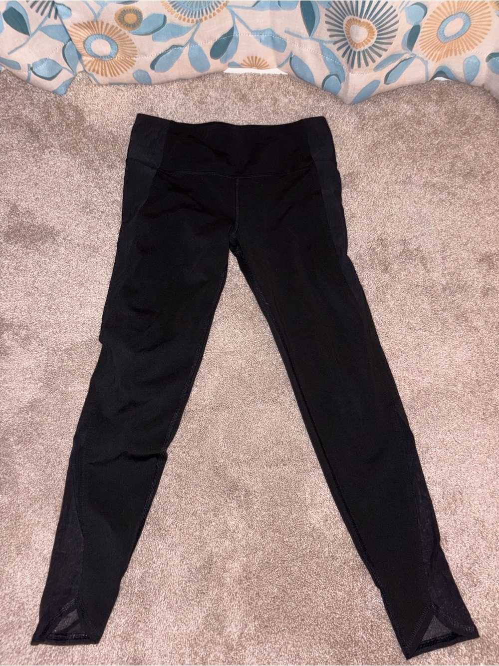 Black DSG leggings with mesh at the ankles